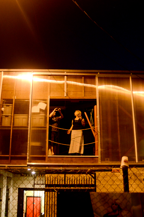 Neighbors of the bar came out to watch from their homes.