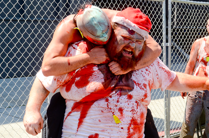 Zombies clash in a zombie fight.