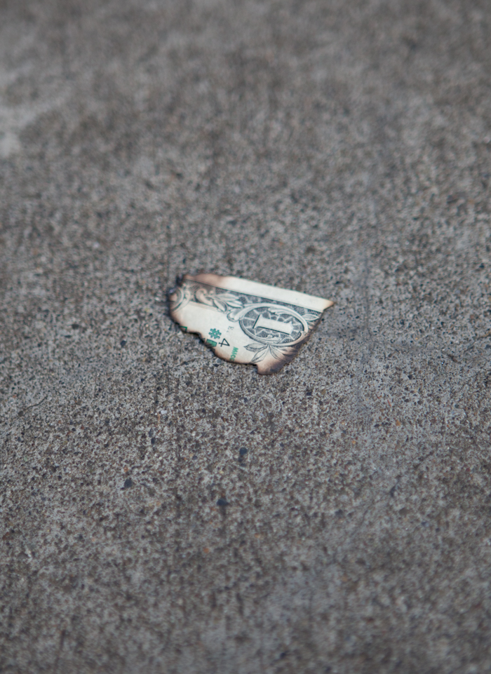 On July 4, the activist group #MicCheckWallSt threw 5,000 $1 bills off