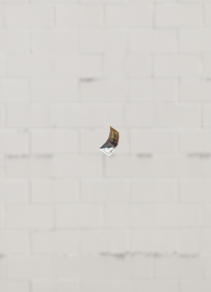 On July 4, the activist group #MicCheckWallSt threw 5,000 $1 bills off