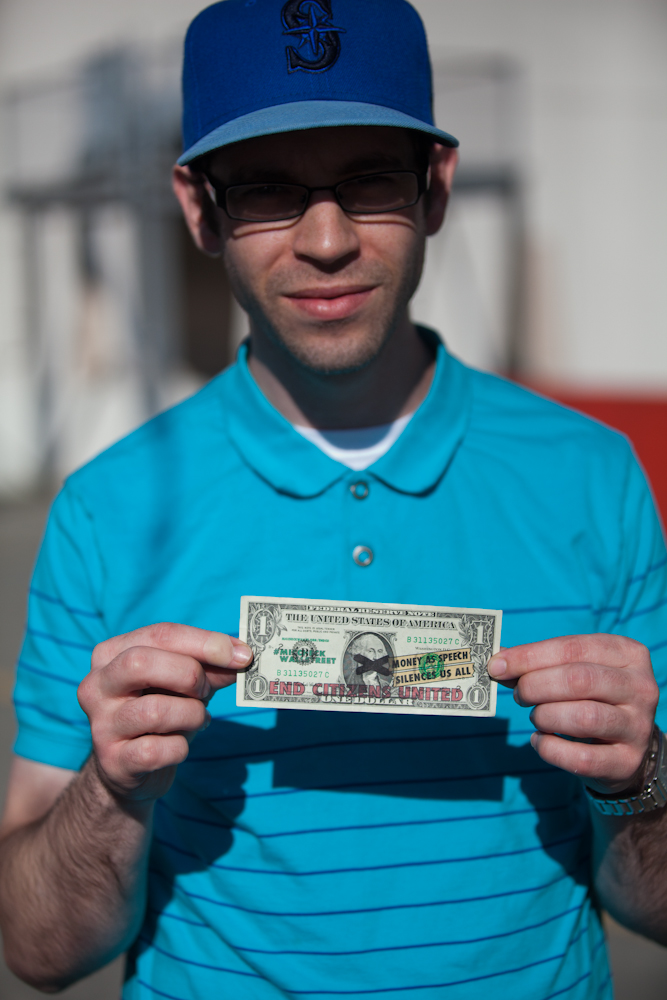 On July 4, the activist group #MicCheckWallSt threw 5,000 $1 bills off