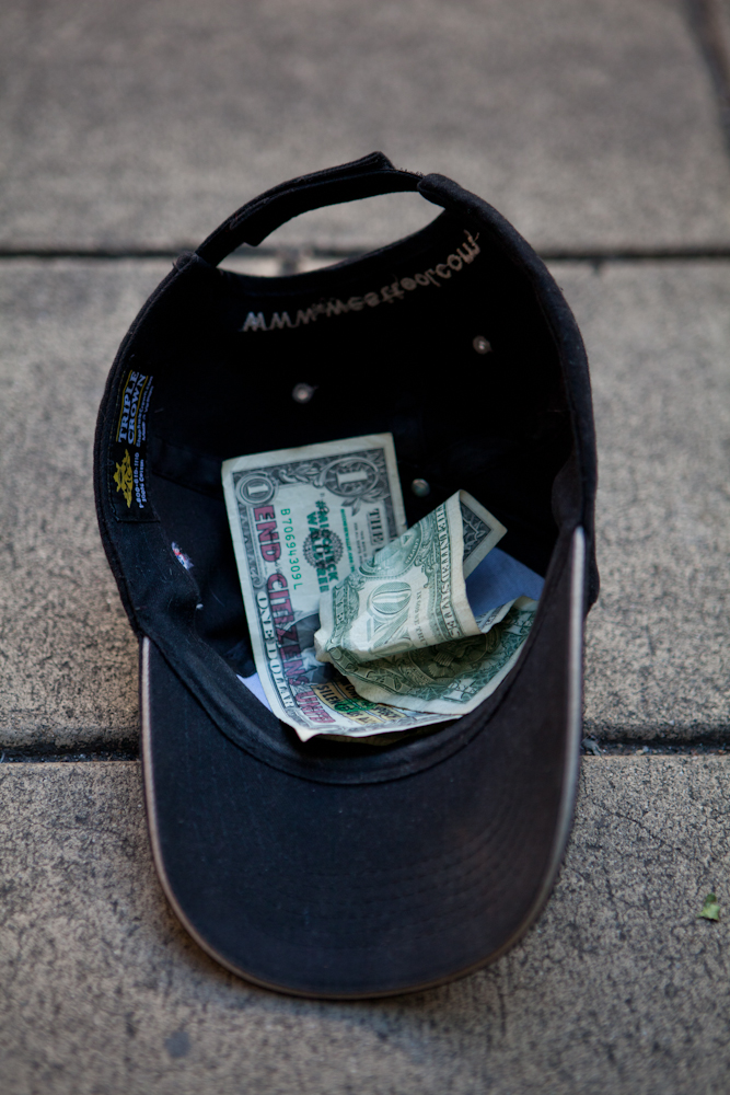 On July 4, the activist group #MicCheckWallSt threw 5,000 $1 bills off