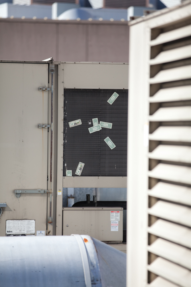 On July 4, the activist group #MicCheckWallSt threw 5,000 $1 bills off