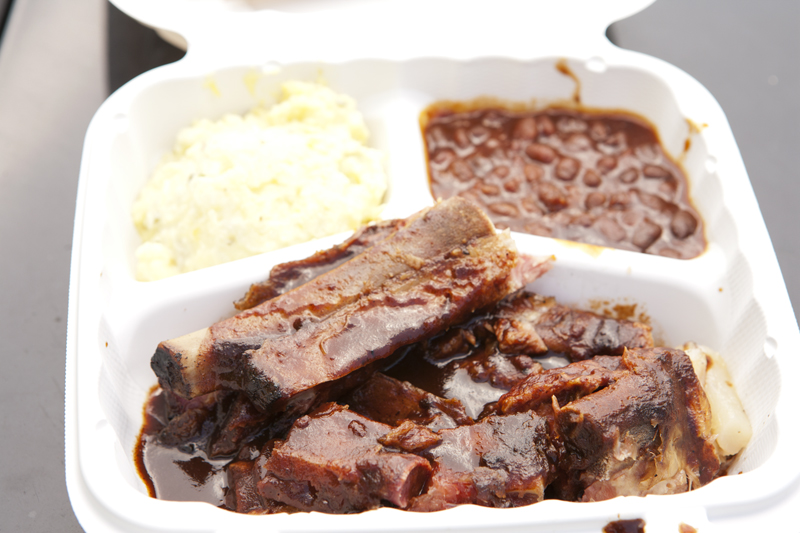 Rib combo with potato salad and baked beans.