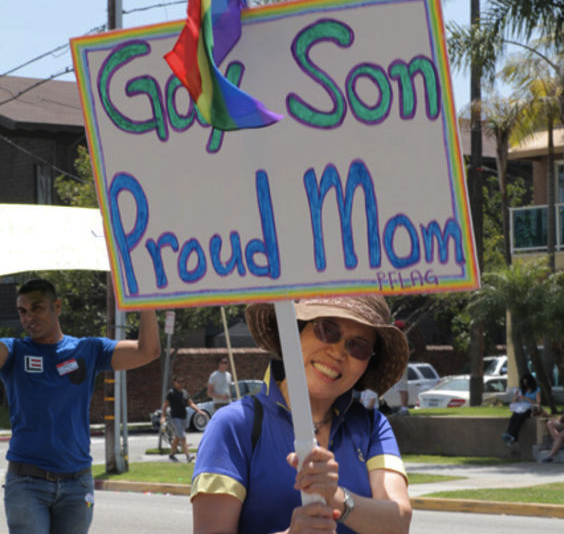 The sign of a happy family at the Long Beach pride parade.