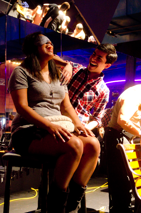 Sensation play at Sensation City. Here two participants share an experience with soft fur.