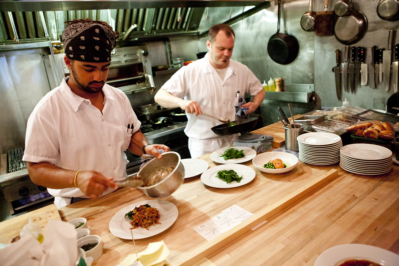 Line cooks Elijah Distefano (left) and Rich Coffey.