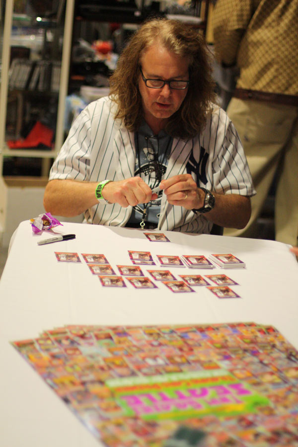 Pinball designer John Popadiuk was one of Saturday's speakers. Afterward, he signed stuff for fans.