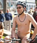 One part critical mass and one part nudist expression, the World Naked