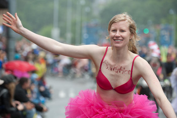 One part critical mass and one part nudist expression, the World Naked