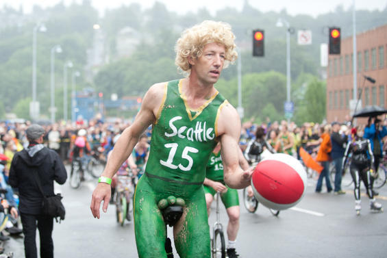 One part critical mass and one part nudist expression, the World Naked