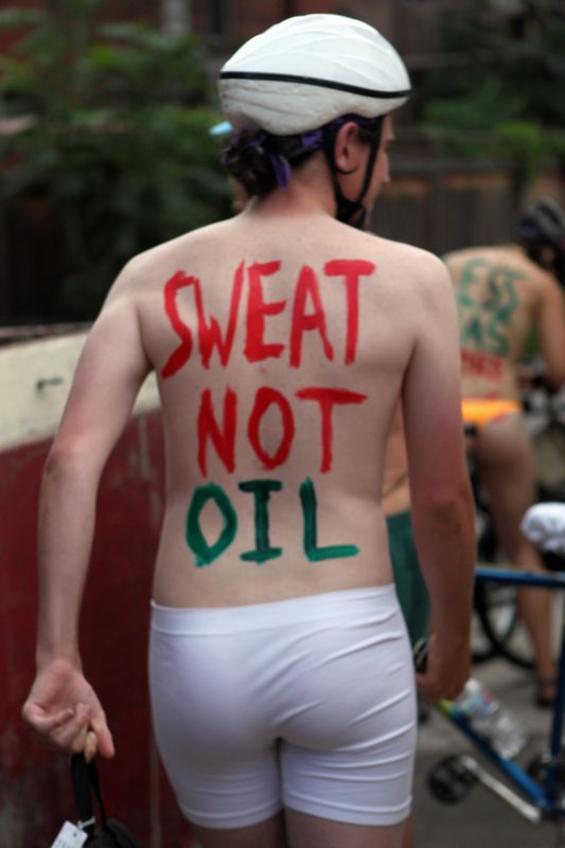 One part critical mass and one part nudist expression, the World Naked