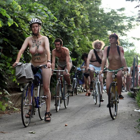 One part critical mass and one part nudist expression, the World Naked
