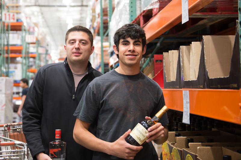 Two friends stocking up at the 4th Ave Costco on Friday night.