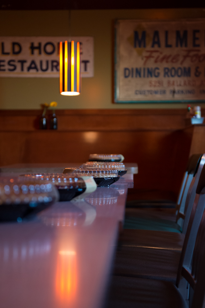 A line of 8 cherry pies baked fresh at Hatties Hat.