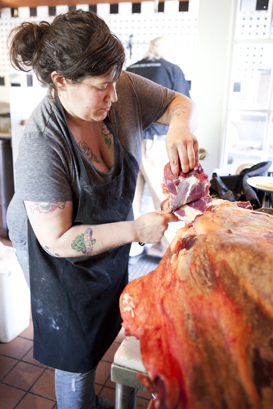 Sea Breeze butcher Lauren Garaventa goes to work on a cow.