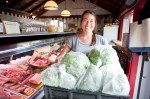 Pacific Crest farm manager Jen Parker delivers fresh produce to La Boucherie. La Boucherie takes around 95% of its produce from the Pacific Crest farm which is located only a few miles away from the restaurant on Vashon Island.
