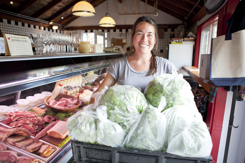 Pacific Crest farm manager Jen Parker delivers fresh produce to La Boucherie. La Boucherie takes around 95% of its produce from the Pacific Crest farm which is located only a few miles away from the restaurant on Vashon Island.