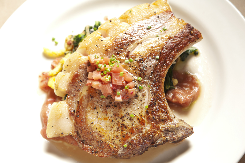 Pork chop with spaetzle, spring kale, and rhubarb.