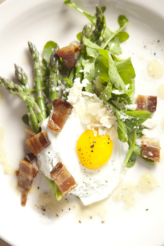Asparagus vinaigrette with bacon, a farm egg, and grana padano cheese.