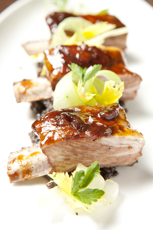 Lamb ribs painted with a shiny tamarind sauce were the victims of prep inattention that resulted in unpleasant mouthfuls of fat that should have been rendered or trimmed.