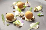 Snail croquettes, plopped in a smear of tart remoulade, had an oddly pixilated quality.