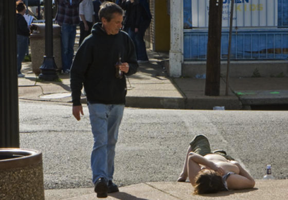 After all the Cinco de Mayo daytime drinking, sometimes you need a nap. A street sleeper on Cherokee Street in St. Louis, Missouri.