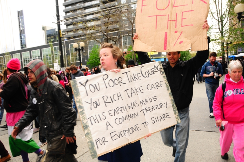 Participants in the annual May Day march for social justice started in