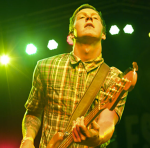 A musician performing and enjoying at the 420 Hangover Festival in Santa Ana, California.