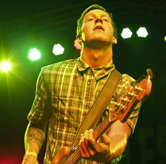 A musician performing and enjoying at the 420 Hangover Festival in Santa Ana, California.