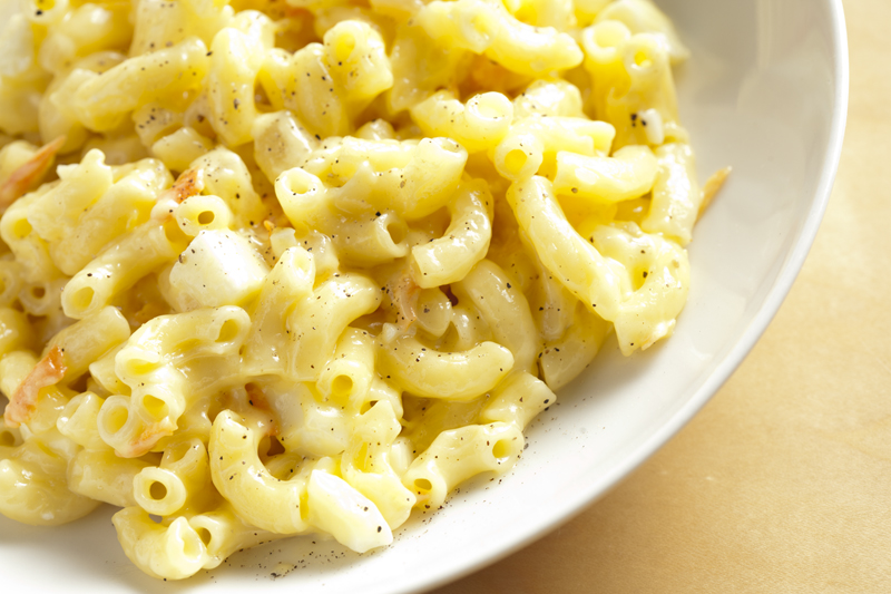 An elegant macaroni salad, dashed with slivered carrots and slicedgreen onions, that probably wouldn't answer to 'mac.'