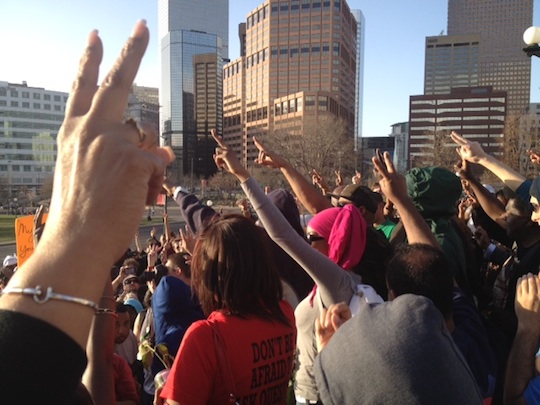 Protesters in Denver, Colorado call for peace on March 26.
