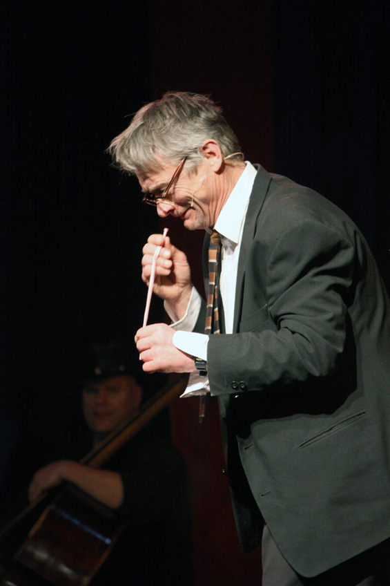 Tom Murphy keeps the crowd laughing with his slapstick comedy act while attempting (unsuccessfully) to create a balloon animal.