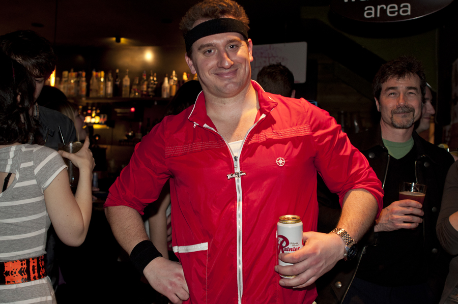 This guy pulled out all the stops, going with the 80's jogging suit and sweatband. He even matches his beer!