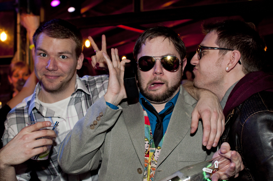 Michael in the center sported an iPhone cover that made his phone into a clunky old 80's brick.