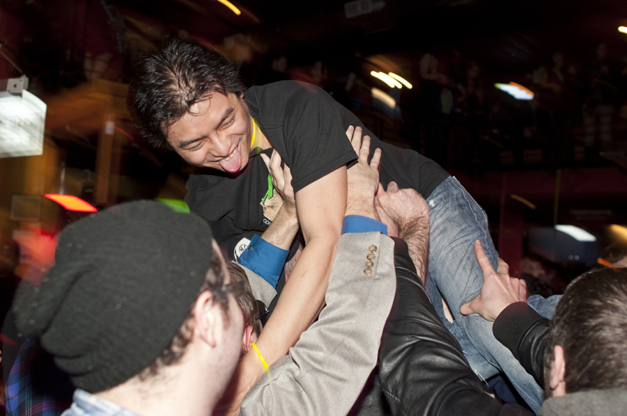 Coolie takes a dive off the stage into the crowd!