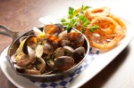 The mussels, slick with butter, were glutted with flavor.
