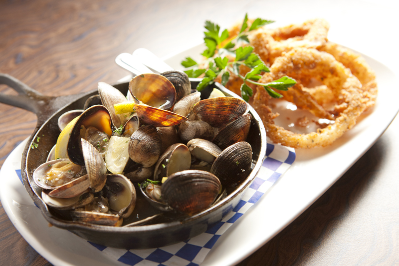 The mussels, slick with butter, were glutted with flavor.