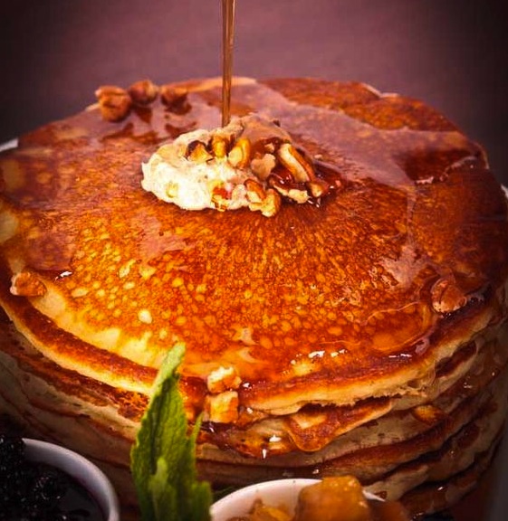 Carb load with buttermilk pancakes, mixed berry compote, and banana walnut and cinnamon apple sauces from City Hall, Miami, Florida.