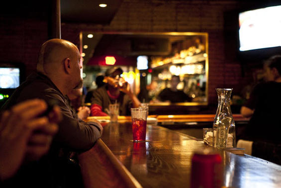 Clientele varies. Expect one gigantic bald man, often menacing. Lake Wood Landing in Dallas, Texas.