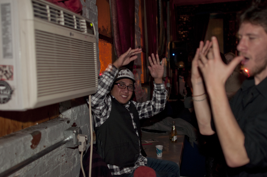 Dancers keep cool by the air conditioning. It was a sweaty dancefloor all night!