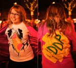 Clad in business attire and wielding boomboxes, hundreds of revelers romped around