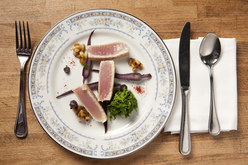 Hawaiian albacore served with carrots and mustard greens.