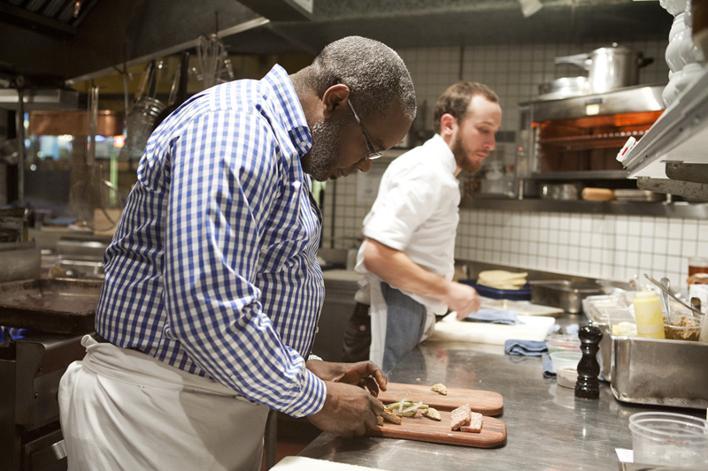 Executive Chef and Owner, Daisley Gordon plates up the pork hock terrine.