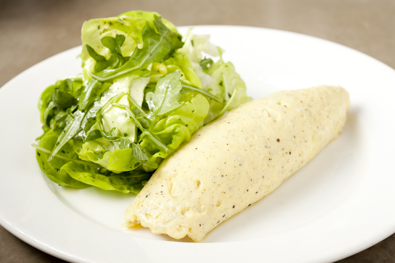 This quiet omelet is almost radically rustic, andaE”as ElizabethDavid famously counseledaE”enormously enhanced by a glass or two ofwine.