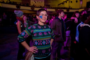 Crowd members donned Merrill's characteristic face paint shapes.