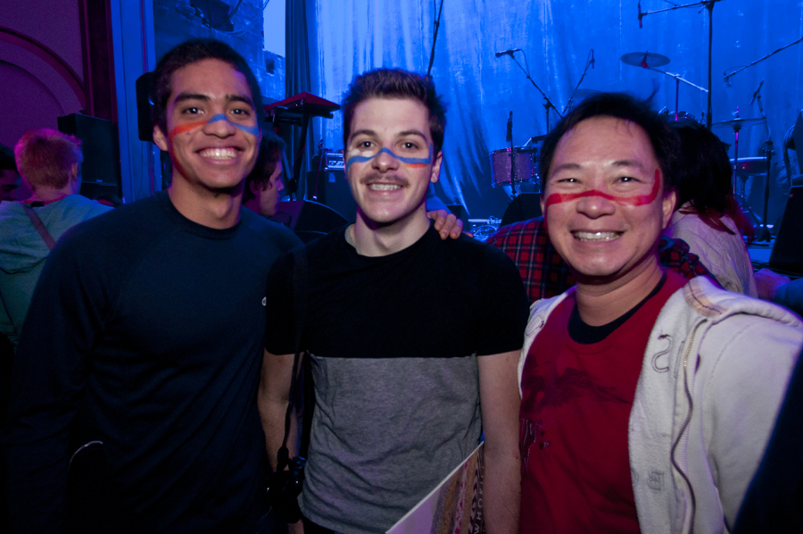 Crowd members donned Merrill's characteristic face paint shapes.
