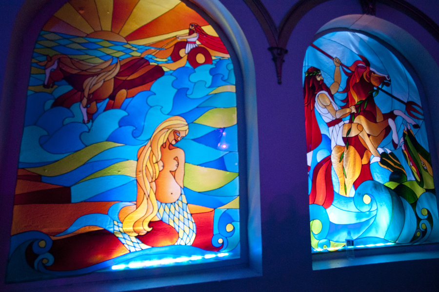 The Neptune features beautiful stained glass of mythical gods.