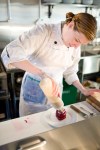 Cook Shannon putting the finishing touches on the beet salad.
