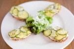 Spackled with goat cheese and topped withtranslucent ruffles of zucchini, the toasty tartines arepassable-plus
